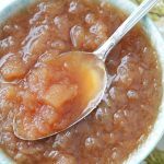 crockpot applesauce in dish with spoon