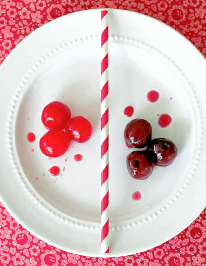 both homemade and store bought maraschino cherries on a white plate