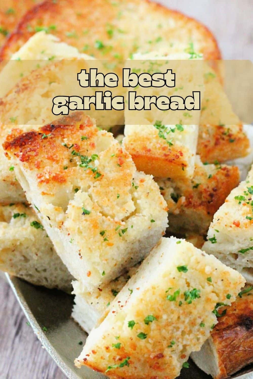 Dry toasting garlic cloves before mixing them with softened butter and Parmesan cheese makes this the best artisan garlic bread recipe. via @foodtasticmom