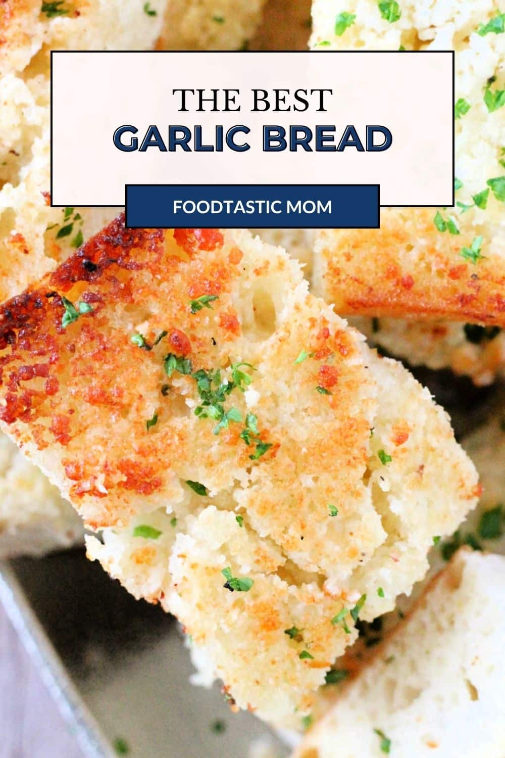 Dry toasting garlic cloves before mixing them with softened butter and Parmesan cheese makes this the best artisan garlic bread recipe. via @foodtasticmom