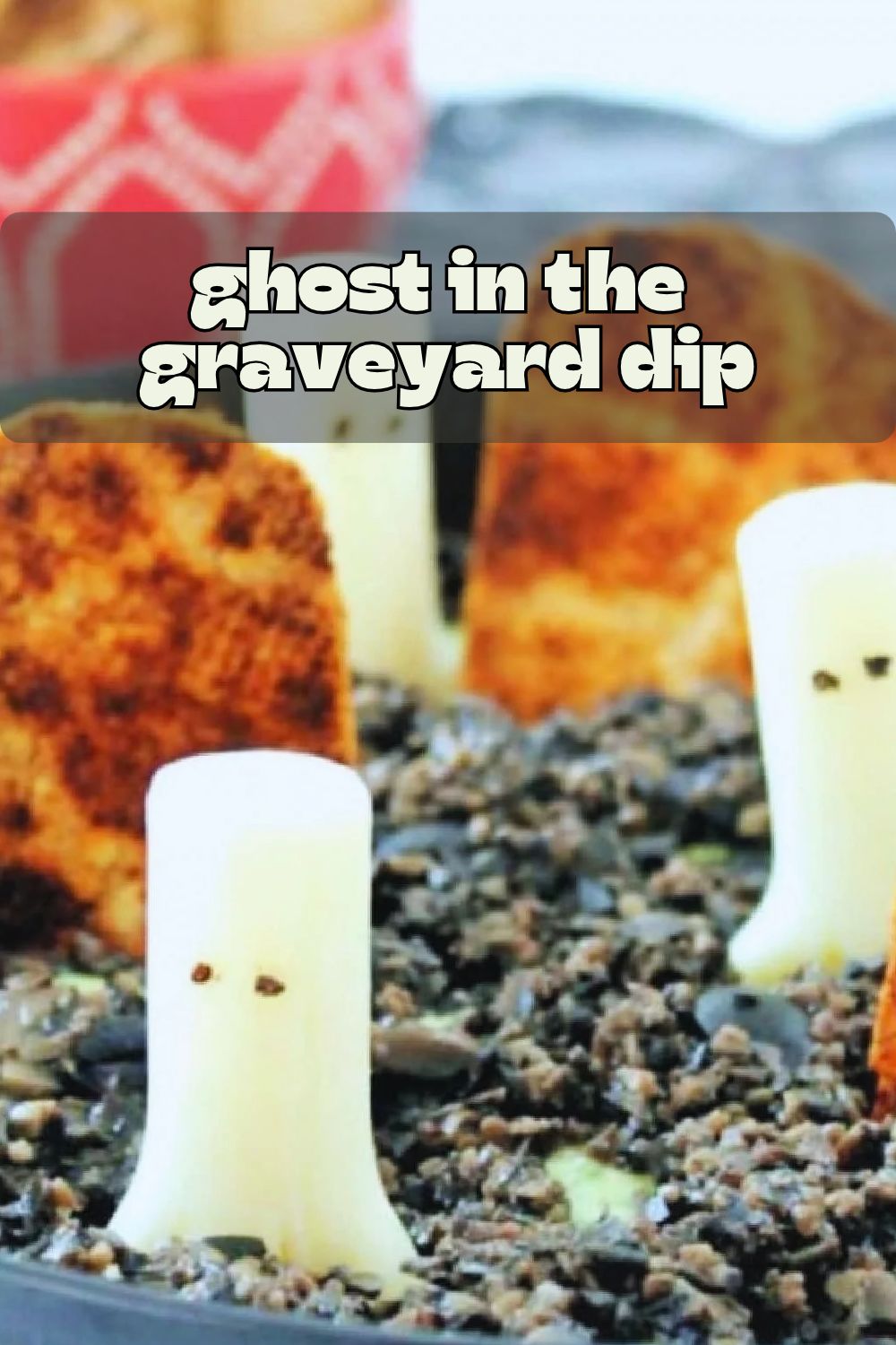 Halloween Dip is based on the classic 'ghost in the graveyard' game. Homemade bean dip is topped with black olive "dirt" and string cheese "ghosts". via @foodtasticmom