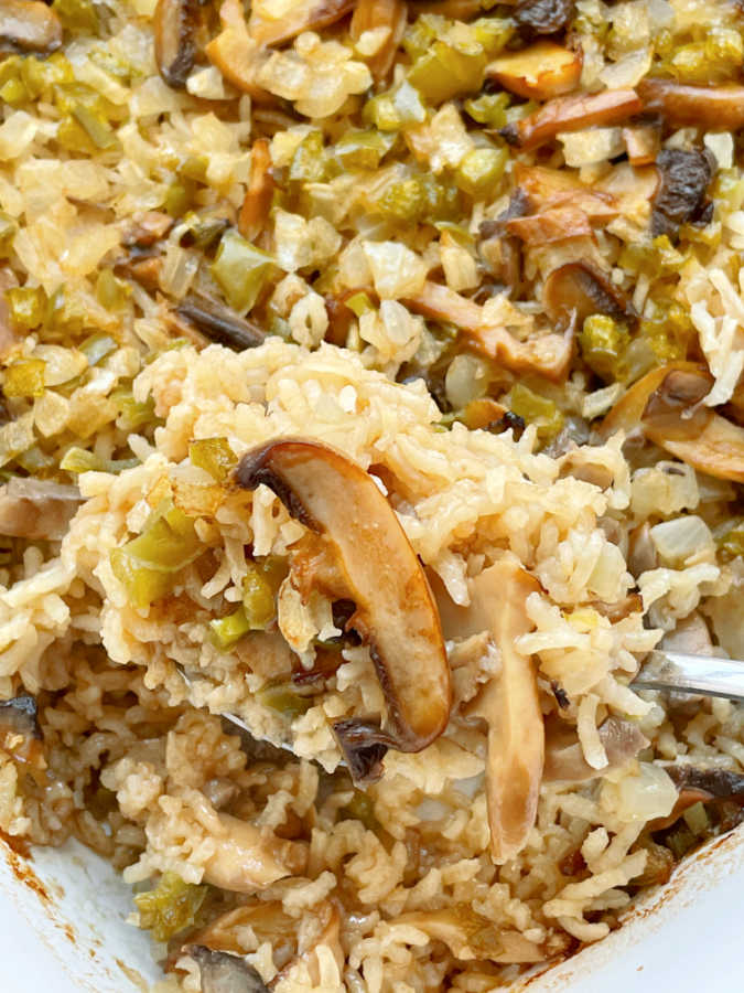a serving of the best rice pilaf topped with mushrooms