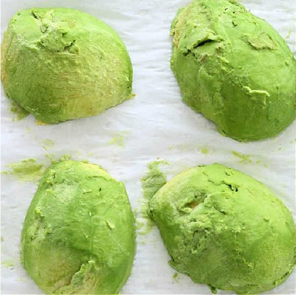 showing avocado halves ready to be preserved in the freezer