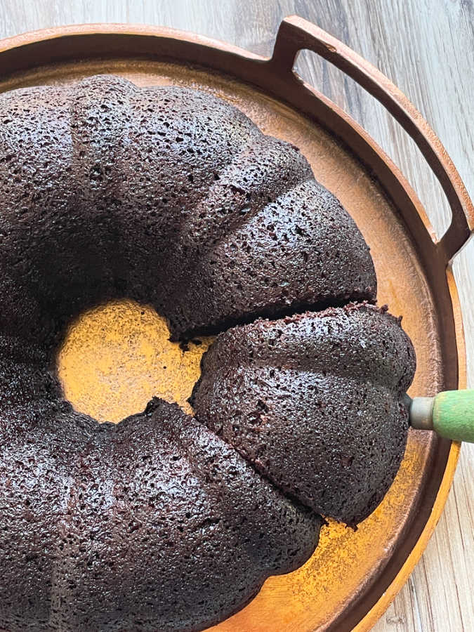 sliced Guinness chocolate bundt cake on a copper platter