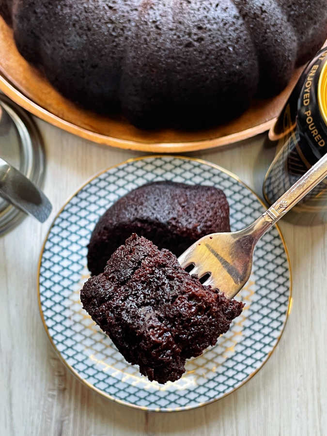 taking a bite of Guinness chocolate bundt cake