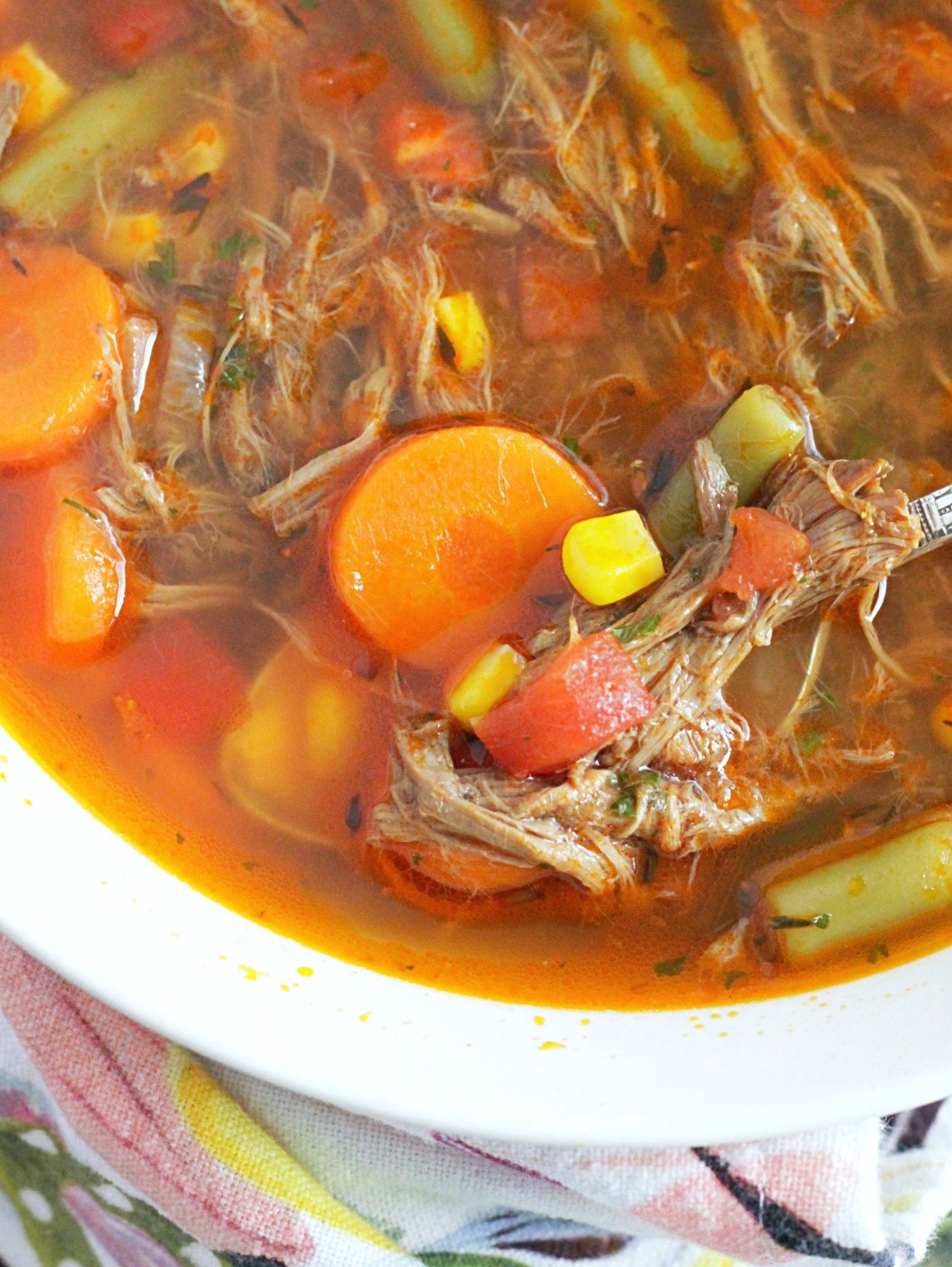 close up of beef vegetable soup in bowl