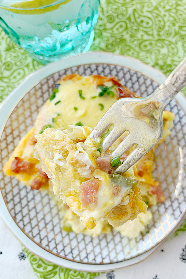 bite of eggs benedict breakfast bake on fork