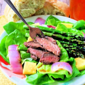 plated steak salad with pineapple vinaigrette dressing