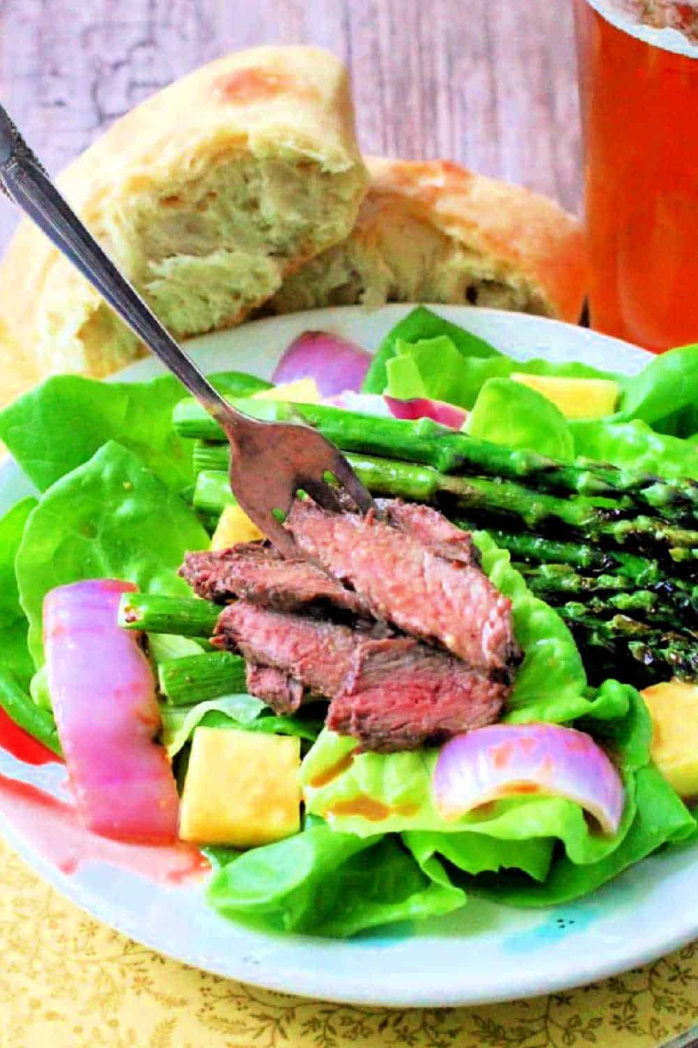 My steak salad recipe is different than the rest. Homemade pineapple vinaigrette is used as both steak marinade and salad dressing. via @foodtasticmom