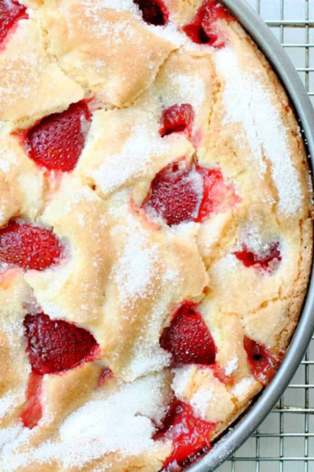 French Strawberry Cake is mixed in one bowl with fresh summer strawberries. It bakes up with a tender custardy middle and crunchy sugary topping. via @foodtasticmom