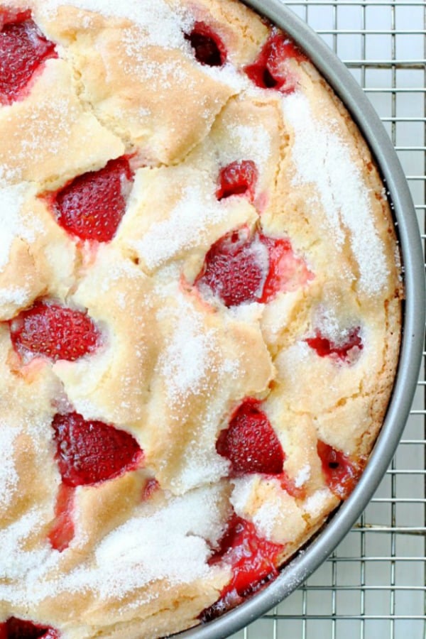 overhead view of french strawberry cake in pan