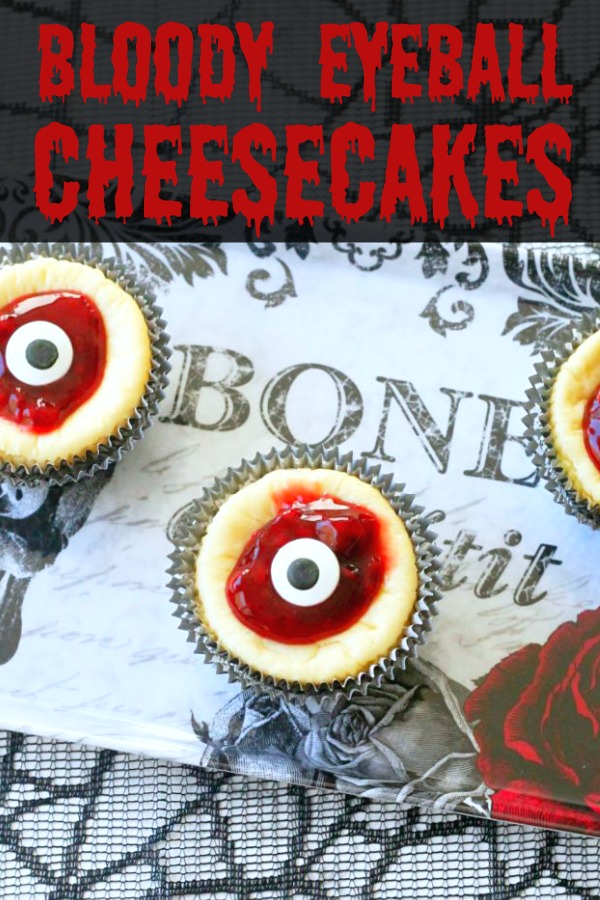 Bloody Eyeball Cheesecakes put the trick in a very delicious treat of white chocolate cheesecakes with an Oreo crust and raspberry topping. via @foodtasticmom