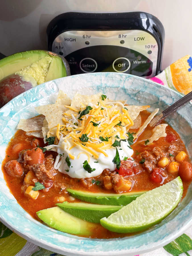 bowl of taco soup setting in front of my slow cooker