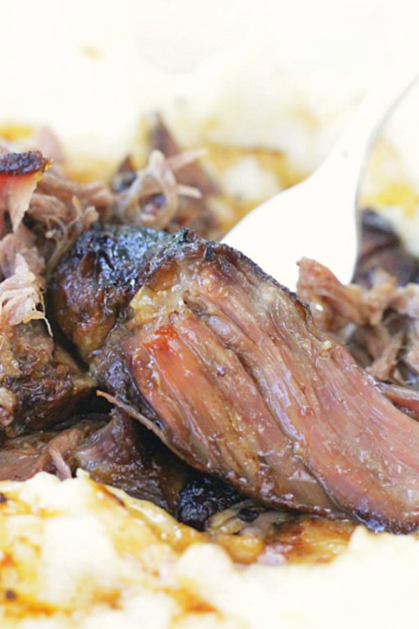 slow cooker short ribs close up with mashed potatoes