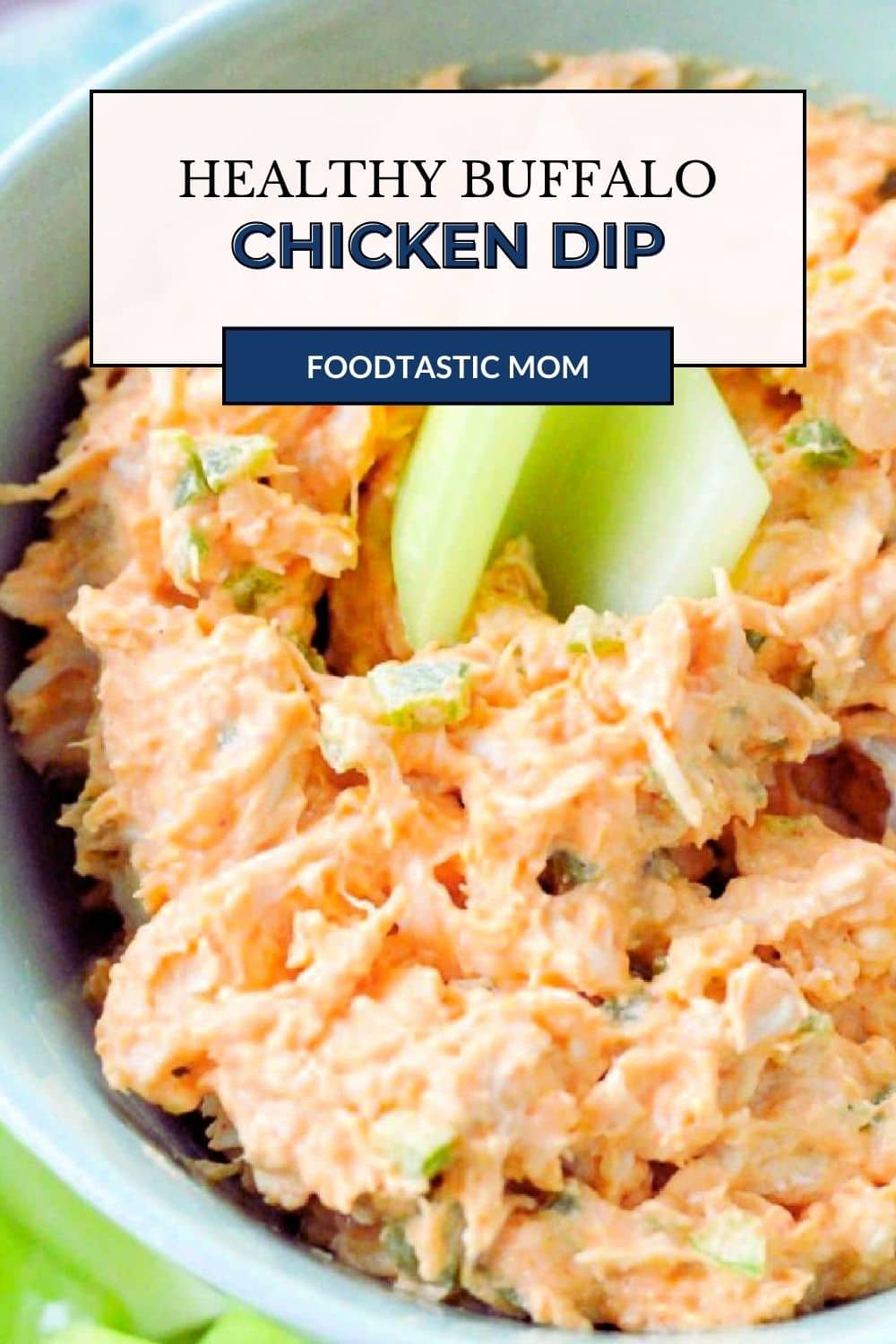 This healthier buffalo chicken dip is served cold to be a delicious dip for fresh celery. It's got a creamy texture and spicy kick. via @foodtasticmom