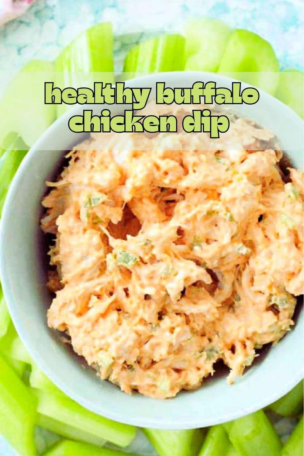 This healthier buffalo chicken dip is served cold to be a delicious dip for fresh celery. It's got a creamy texture and spicy kick. via @foodtasticmom