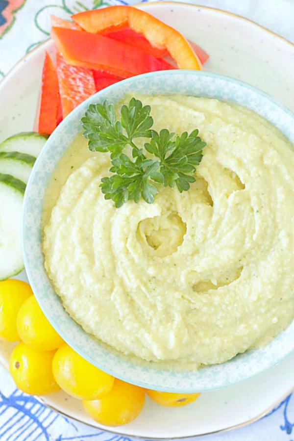 tahini free hummus in bowl with fresh vegetables