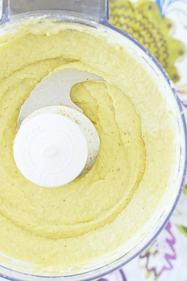 tahini free hummus in bowl of food processor