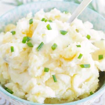 Party Potatoes are the ultimate make-ahead potatoes for holiday entertaining! Creamy mashed potatoes baked in the oven when ready to serve.