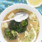 overhead view of tortellini broth bowl