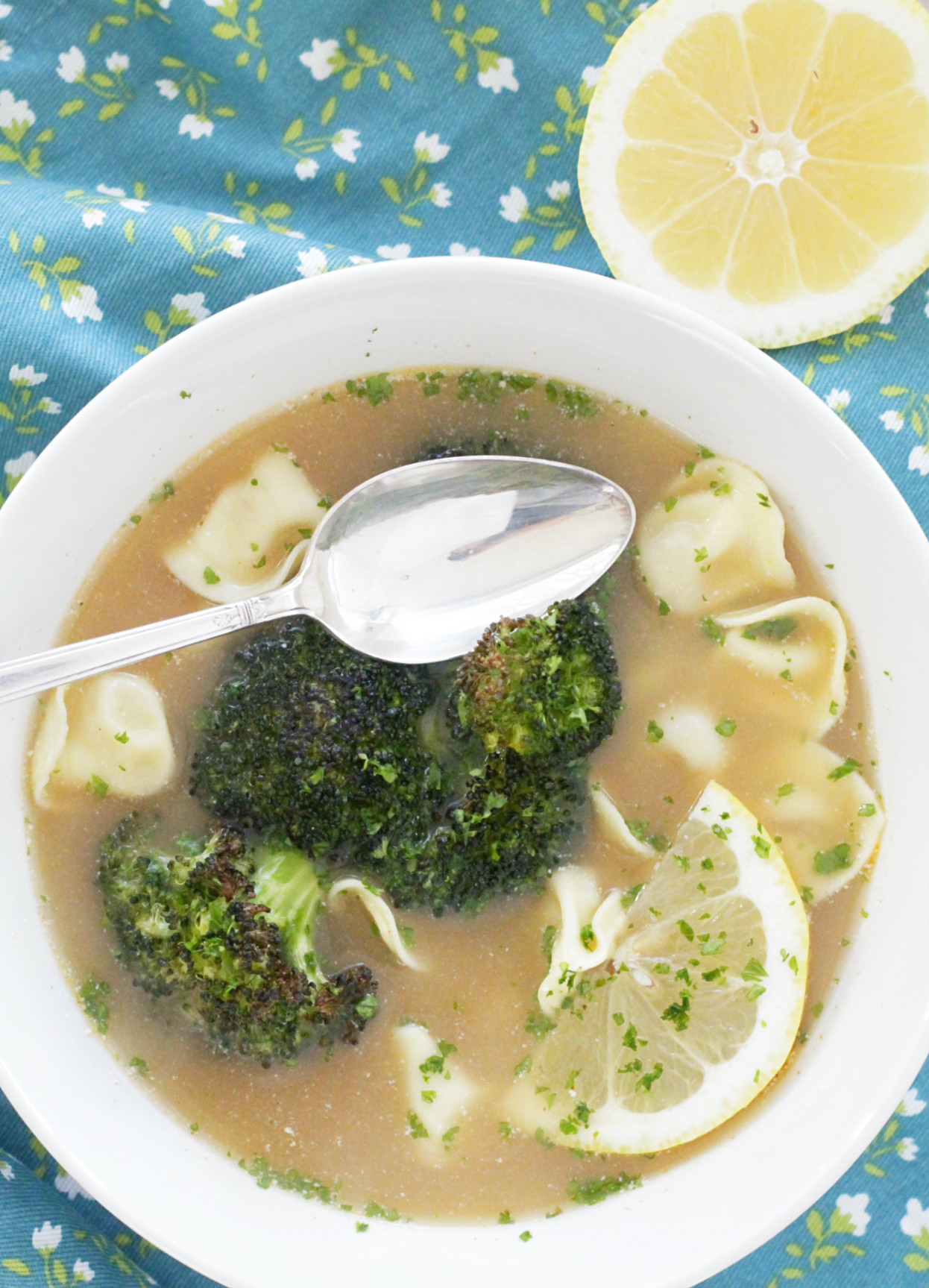 overhead view of tortellini broth bowl