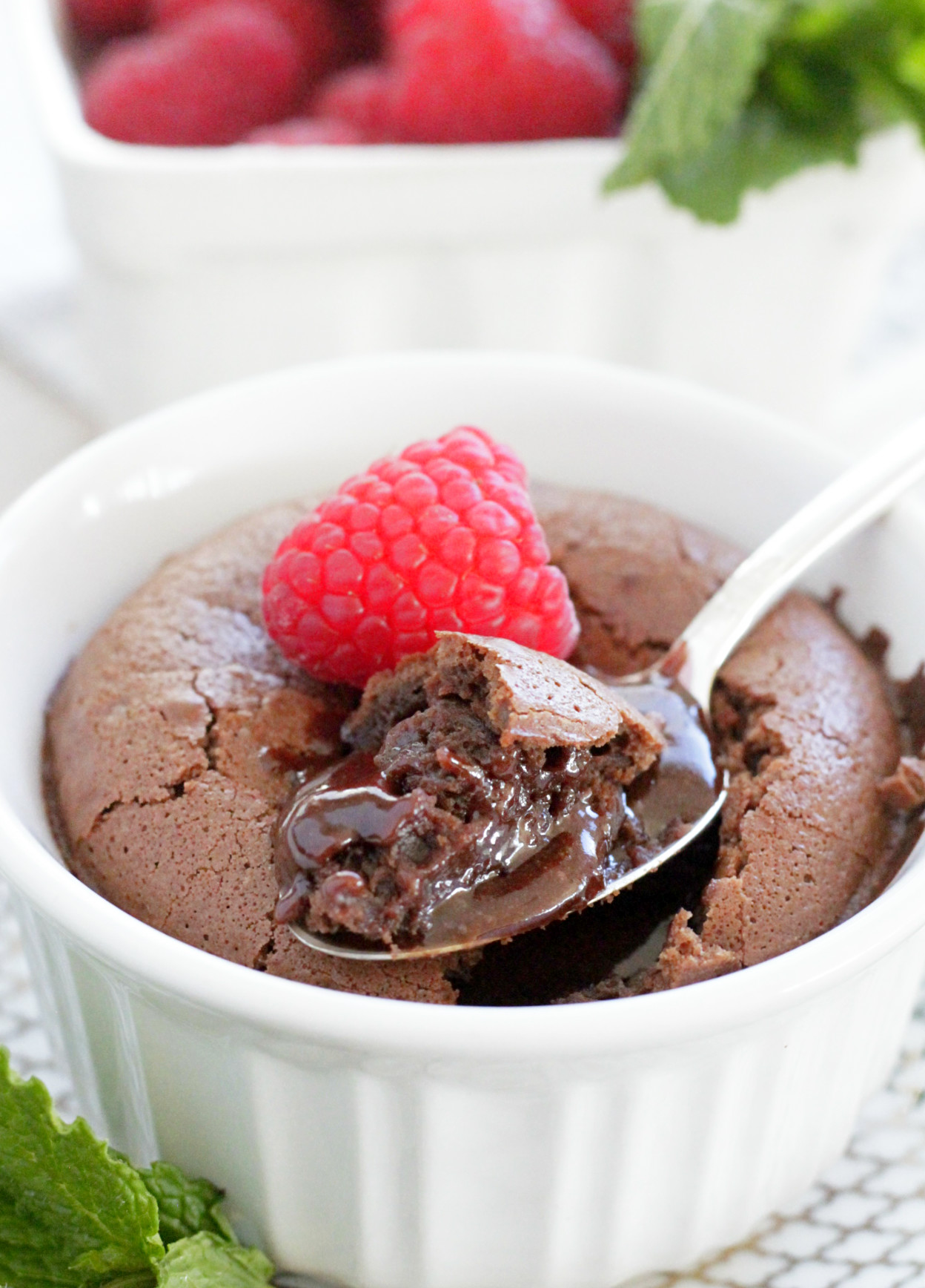 lava cake with raspberry and spoon