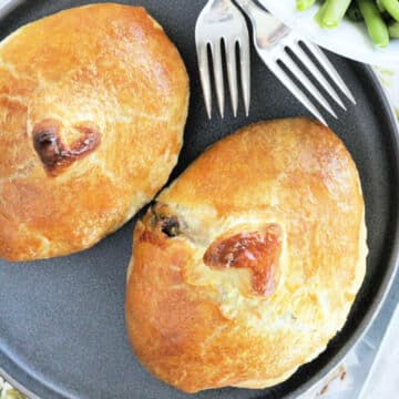 two chicken in a love nest on a plate ready to serve
