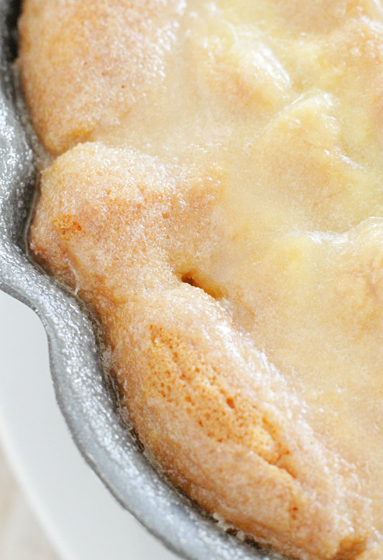 Kentucky butter cake in pan close up showing bourbon glaze