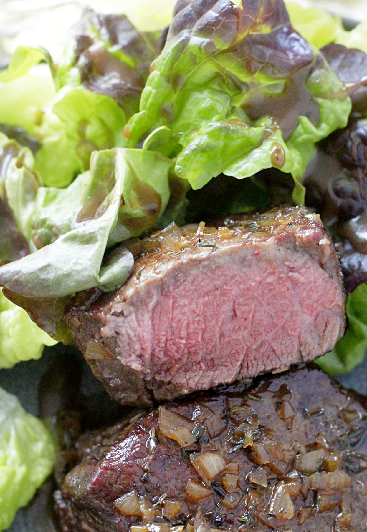 reverse sear filet with champagne butter sauce cut in half