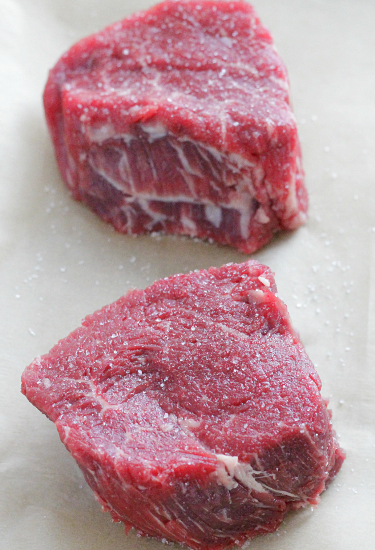 raw filet mignon steaks before baking