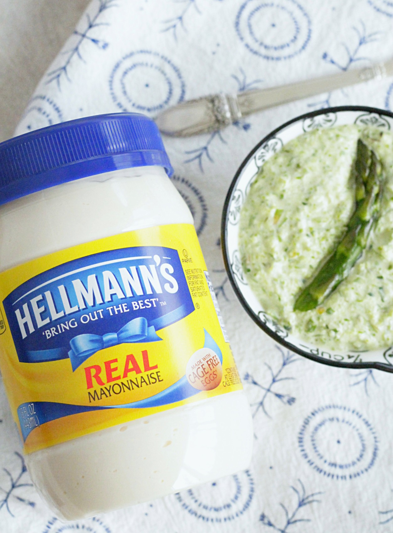 jar of hellmann's mayonnaise next to small bowl of asparagus mayonnaise