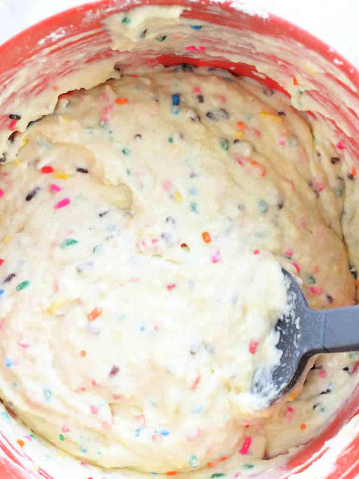 mixing bowl with funfetti pancake batter ready to be cooked