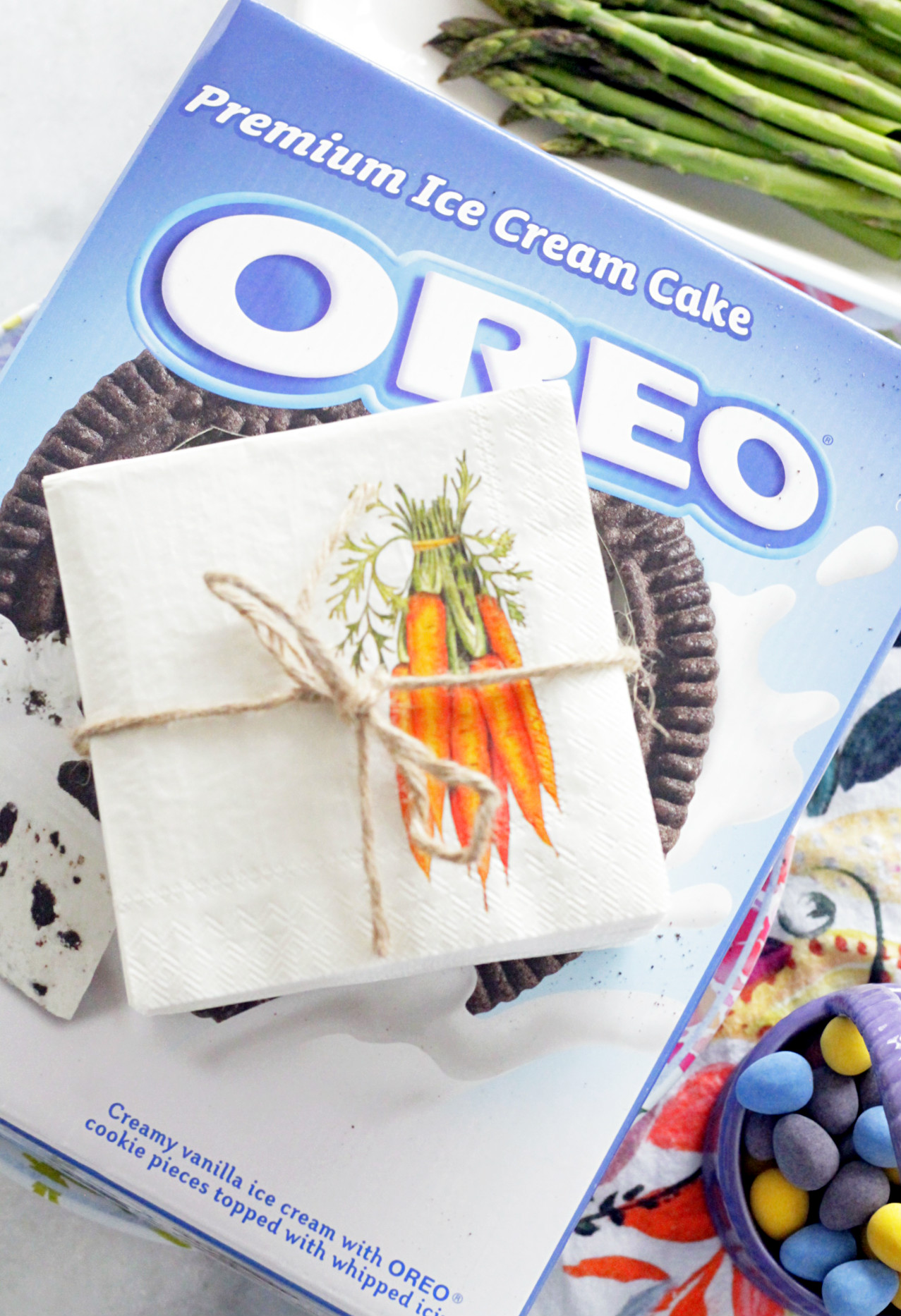 overhead picture of OREO ice cream cake box with carrot napkins