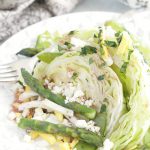 plated spring wedge salad featuring asparagus