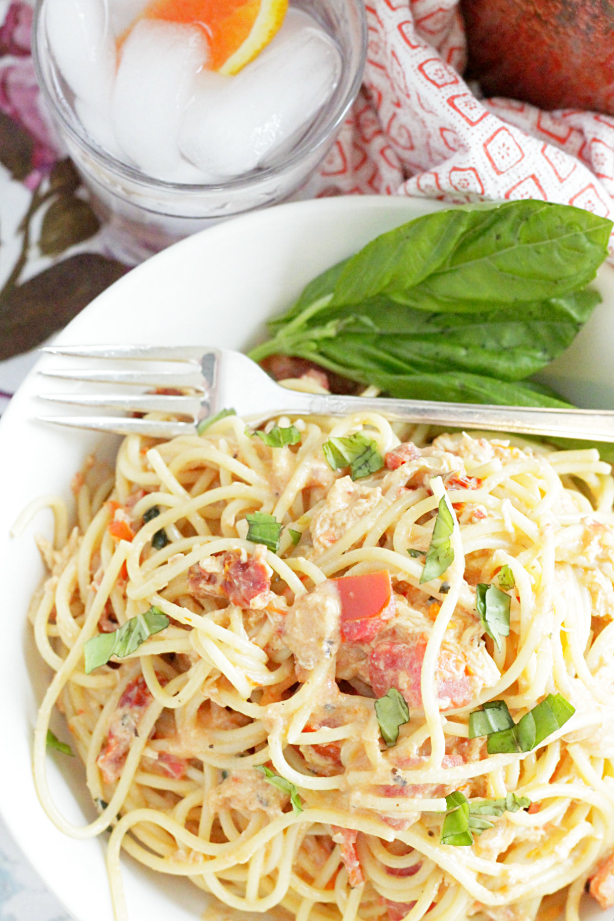 tuscan chicken pasta sauce in bowl overhead view