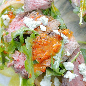 open face grilled steak sandwich top view close up