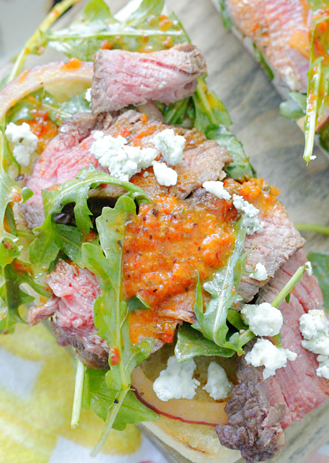 open face grilled steak sandwich top view close up