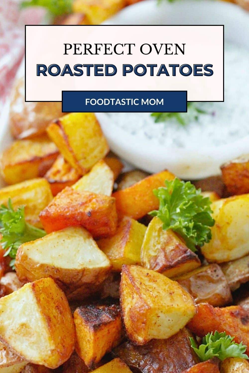 These perfect oven roasted potatoes with creamy herb dipping sauce are a crowd pleasing side dish. They are a mix of sweet potatoes, Yukon Golds and red potatoes. via @foodtasticmom