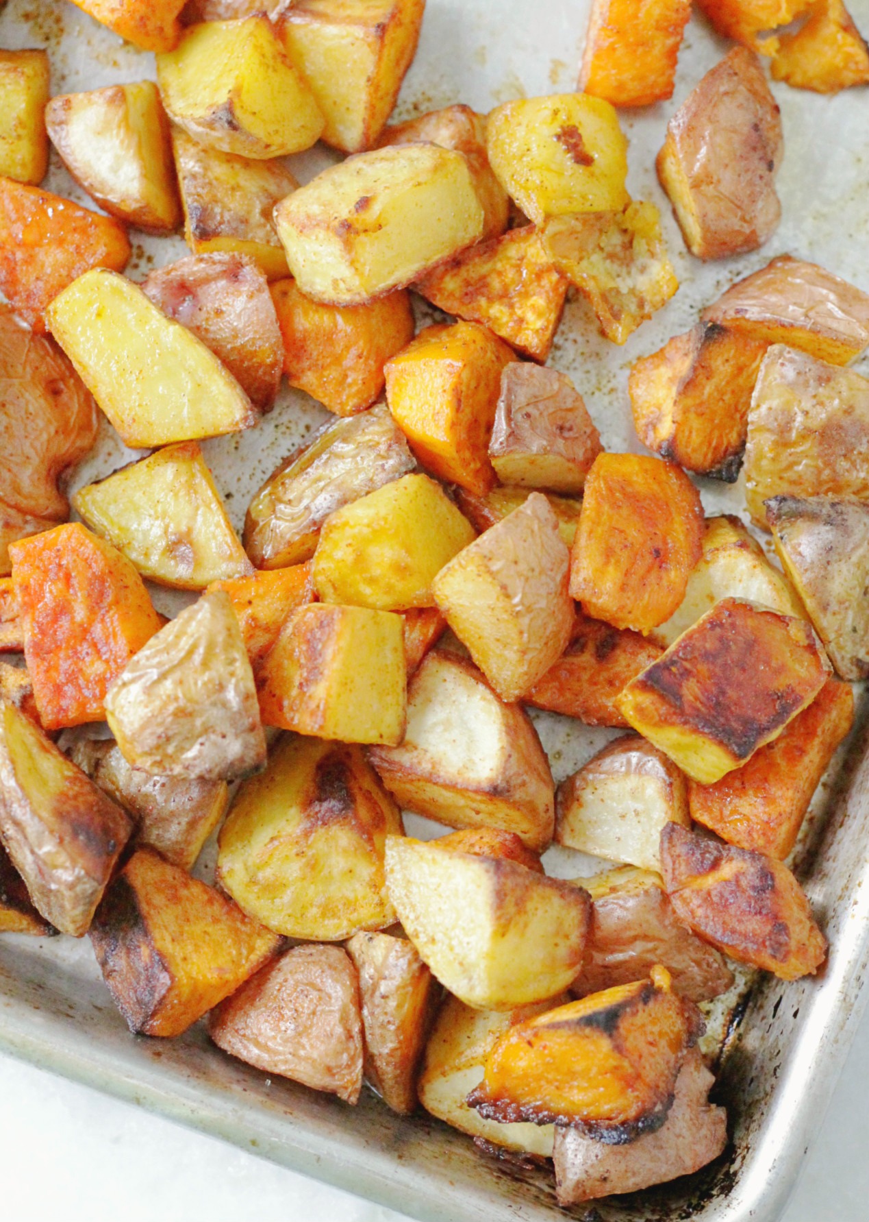 perfect oven roasted potatoes overhead view on a sheet pan