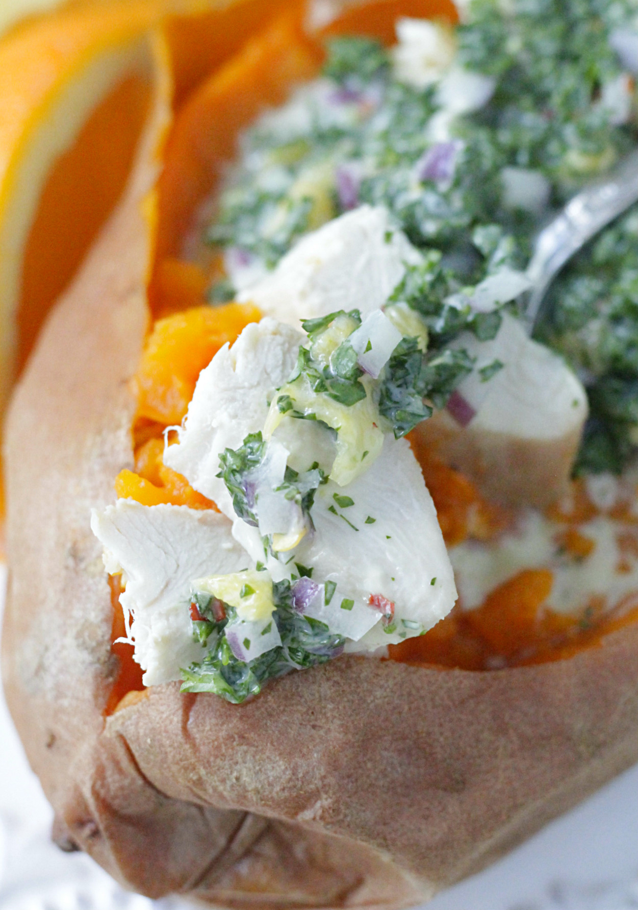 creamy chimichurri chicken stuffed sweet potatoes