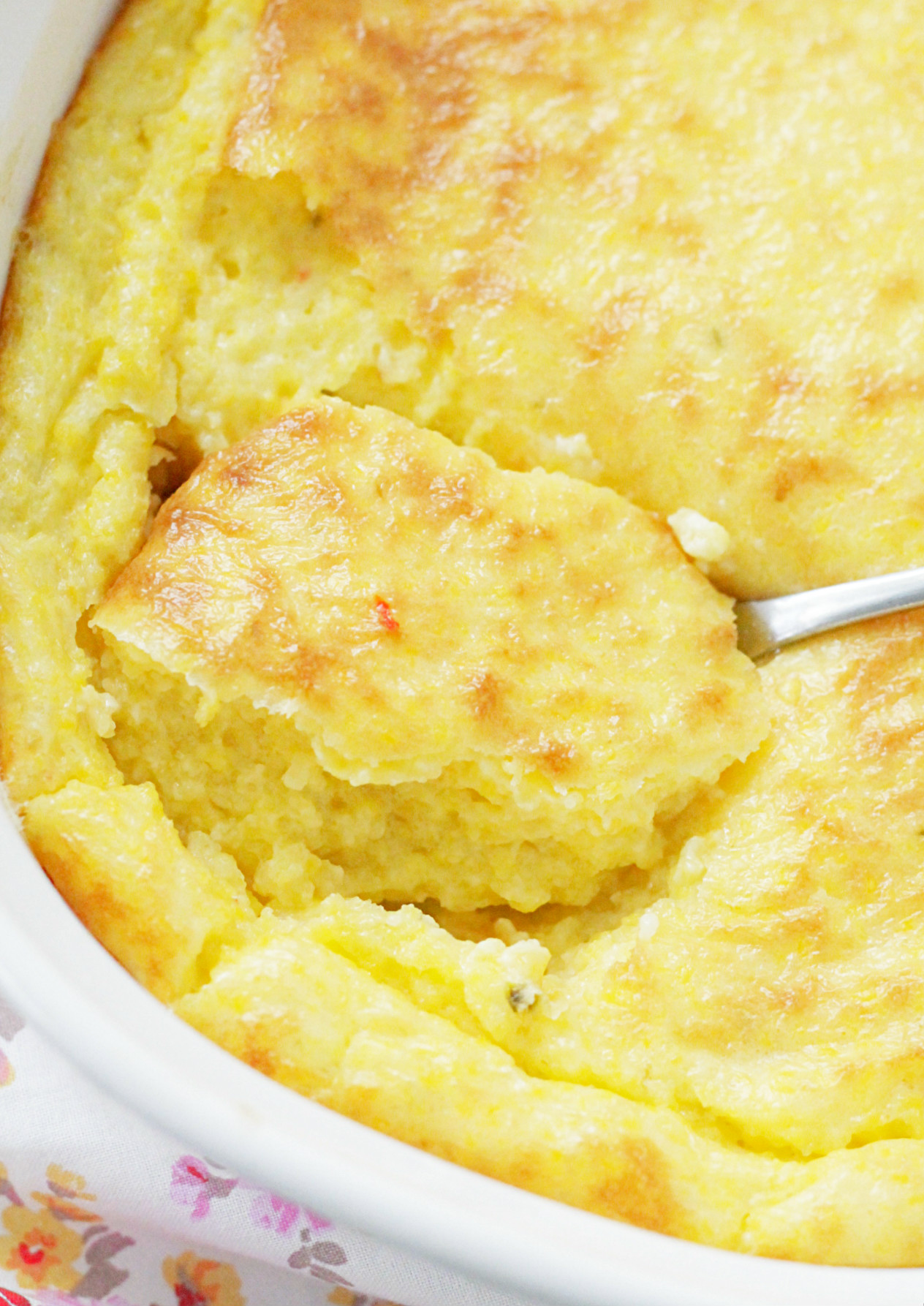 pepper jack cheese grits in dish with spoon