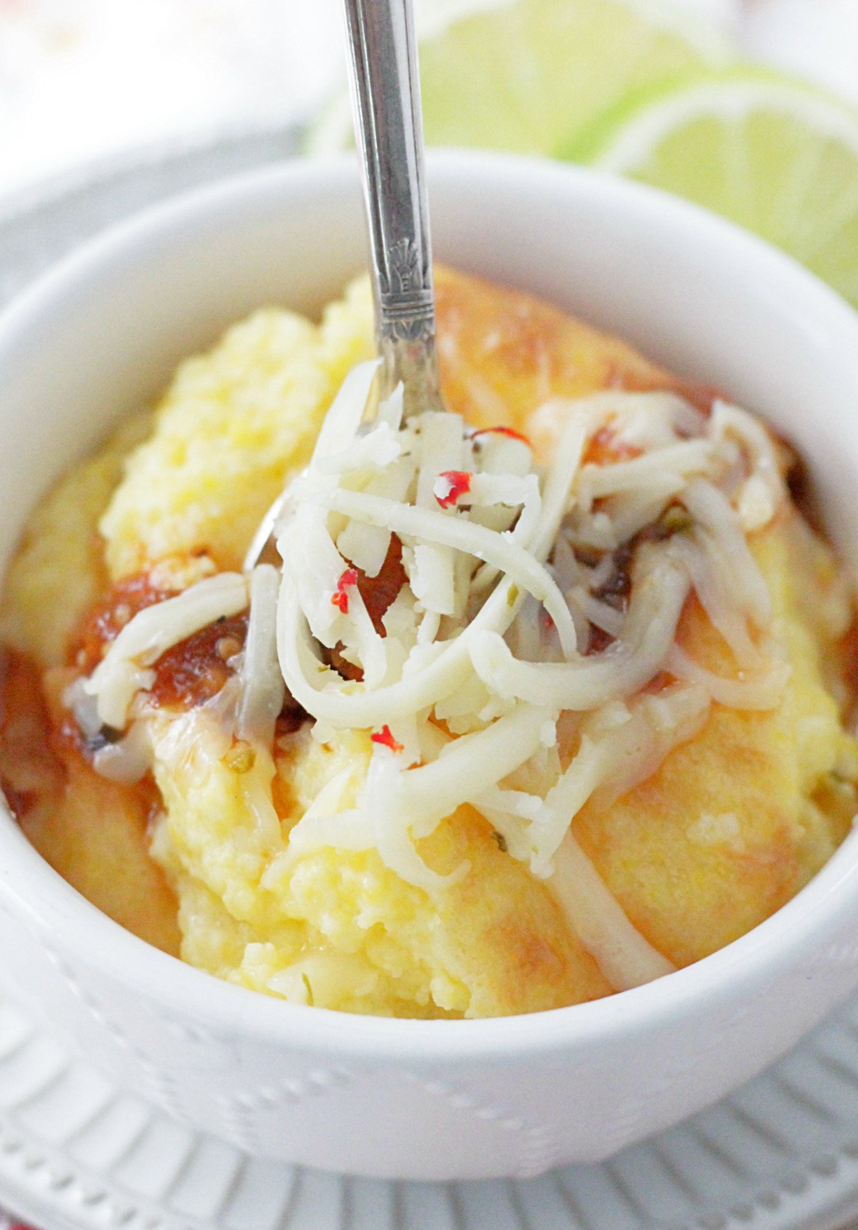 pepper jack cheese grits in bowl with spoon