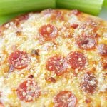 perfect personal pizza on a plate with celery