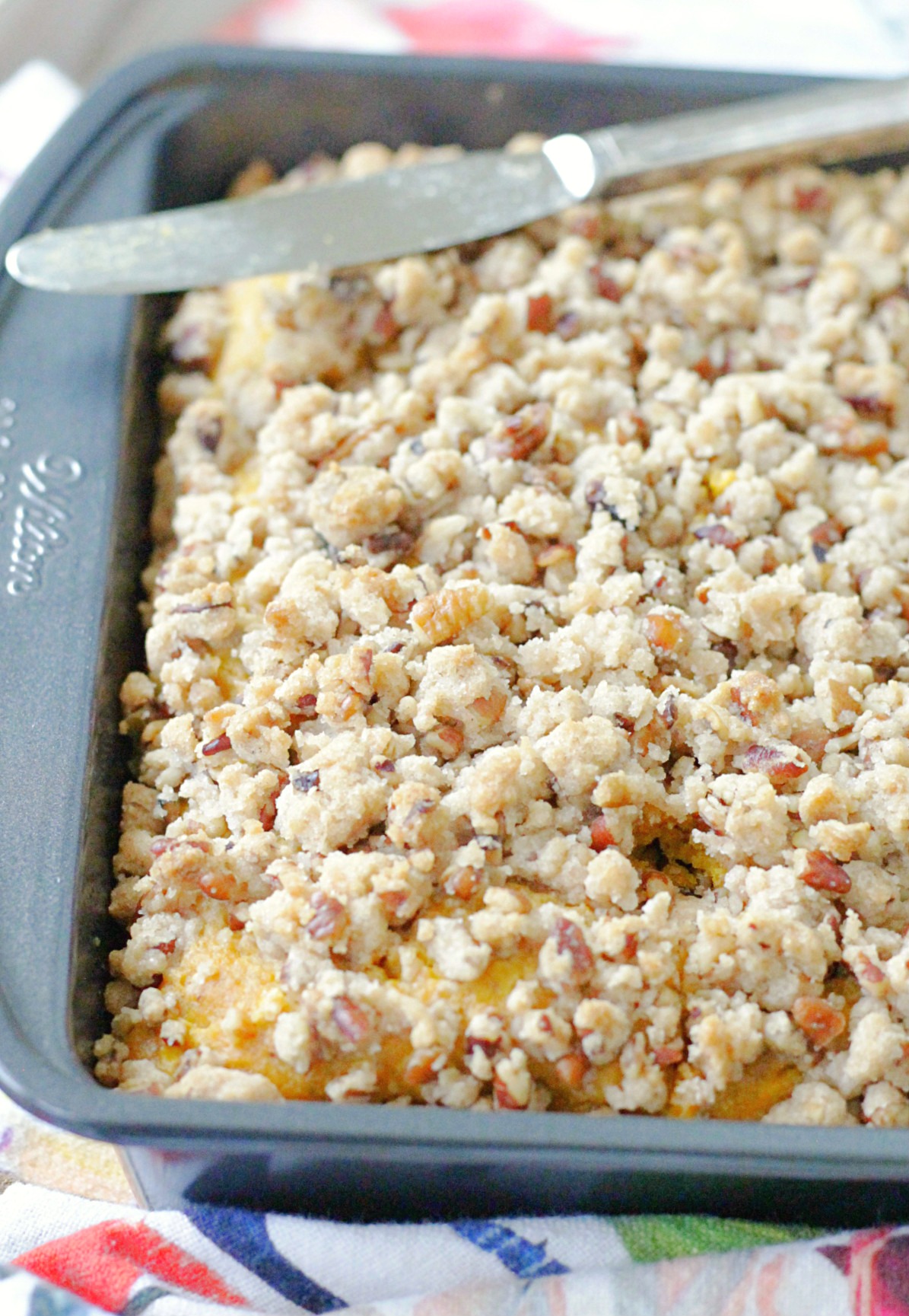 whole pumpkin apple coffee cake in baking pan