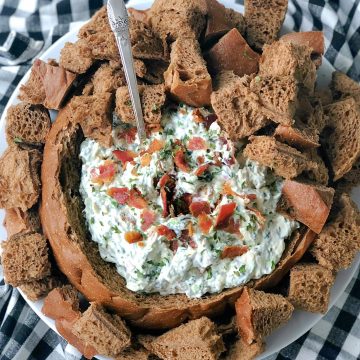 bacon party dip in a bread bowl overhead view