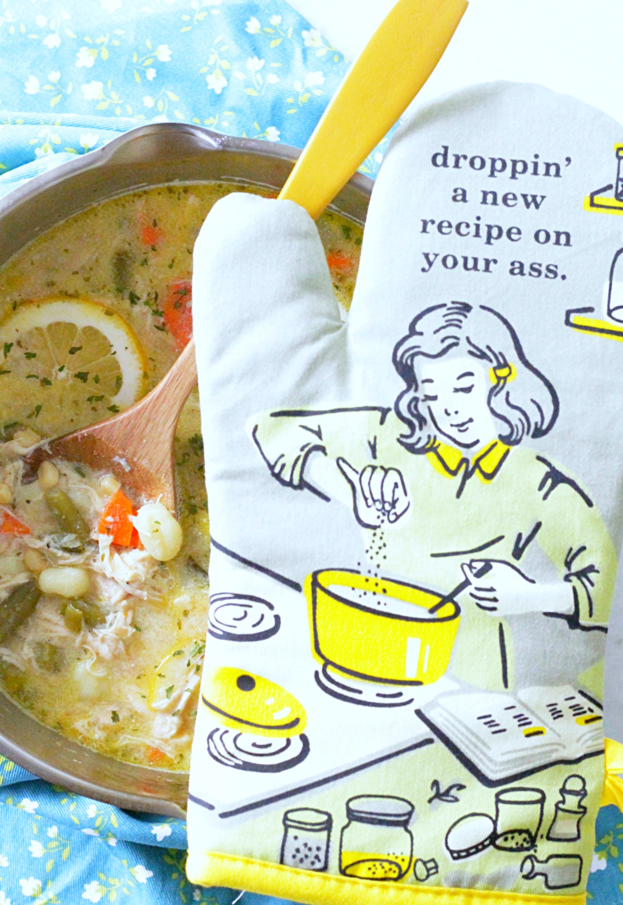 creamy lemon chicken gnocchi soup with oven mitt