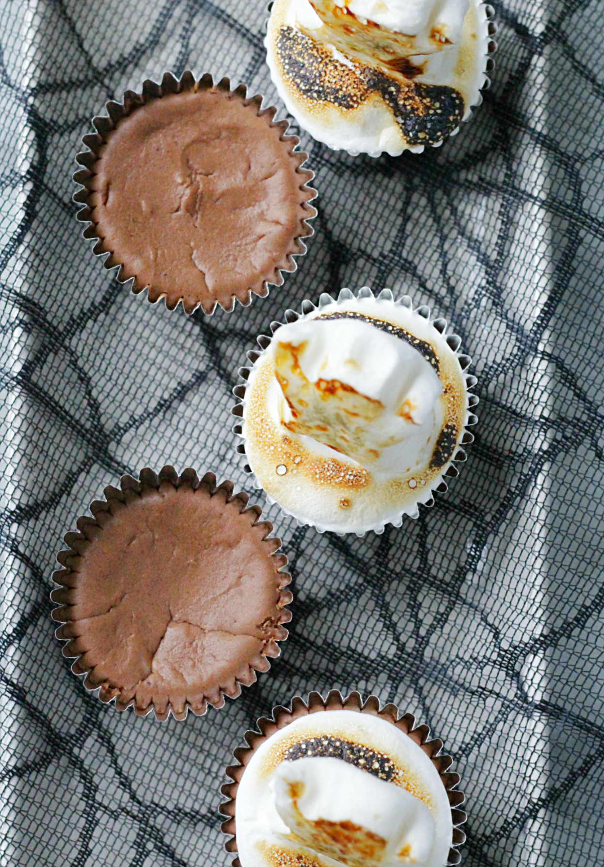 overhead view of ghostly s'mores cheesecakes