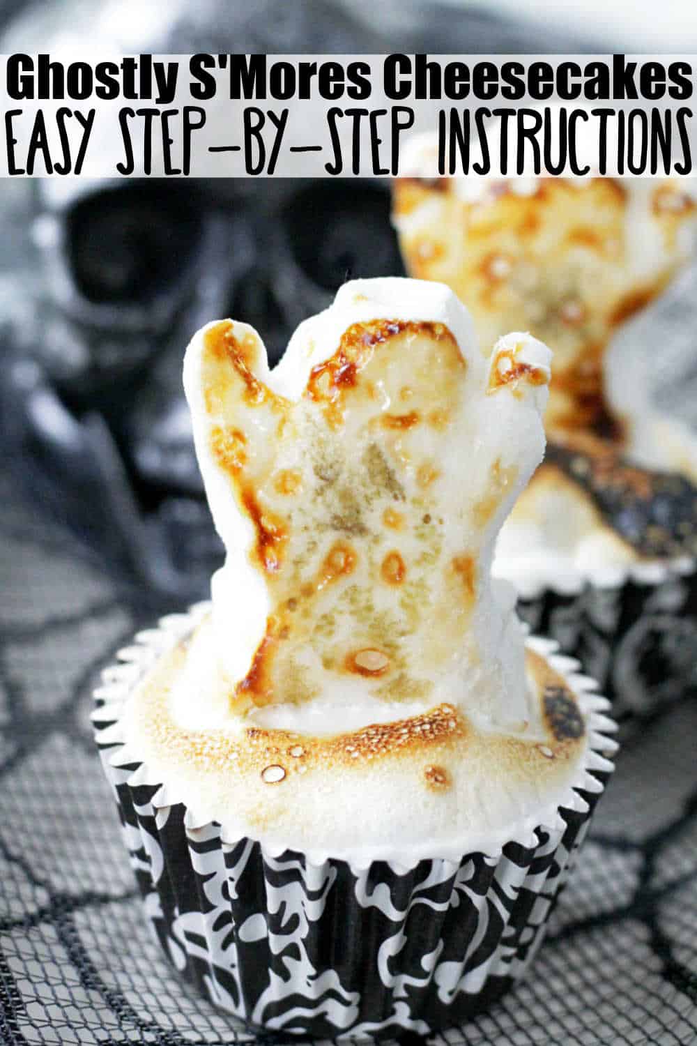 Ghostly S'Mores Cheesecakes are a festive and delicious treat for Halloween, combining graham cracker crust, velvety chocolate cheesecake filling and toasted marshmallow topping. via @foodtasticmom