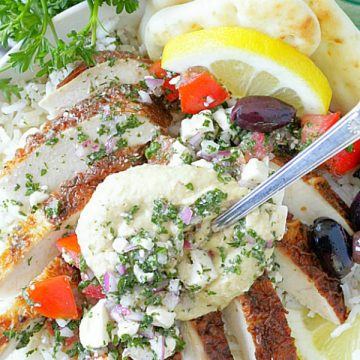 overhead view of greek chicken rice bowls