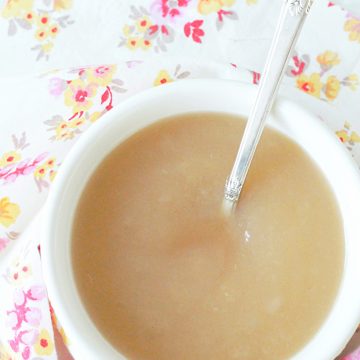 instant pot applesauce in bowl with spoon